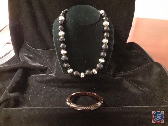 black beaded necklace and bengal bracelet