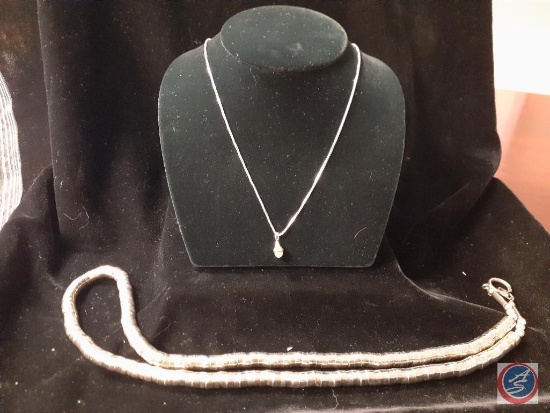 silver-tone necklace and small silver necklace