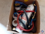 Box Containing Assorted Bottles of Refrigerant and Nozzles