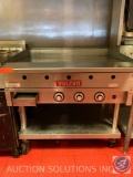 Vulcan 36 inch flat top griddle on a base with casters