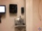 Stainless Steel Handwashing Sink Measuring 17'' X 15 1/2'', Tork Paper Towel Dispenser and Soap