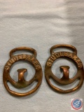 A pair of Studebaker harness chain holders brass with patina