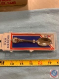 Souvenir spoon from Anheuser bush and a vintage harness hook from JG Provost shoe and harness repair