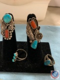 (4) turquoise and coral rings some are marked Sterling