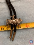 Rodeo bolo tie with a cloth tie string