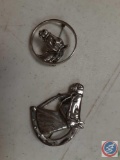 Two Sterling horse pins