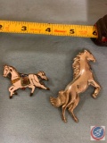 (2) sterling silver horse pins, one is an enameled carousel horse
