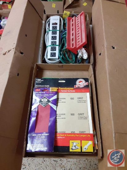 Packs of Sandpaper and Electrical Extension Cords