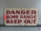 Danger Bomb Range Keep Out Sign Measuring 24'' X 12''