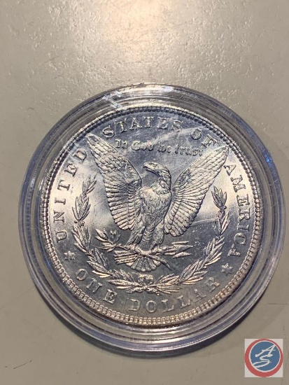 1879 MORGAN SILVER DOLLAR, WEIGHING 1.15OZ...