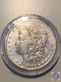1882 MORGAN SILVER DOLLAR, WEIGHING 1.13OZ