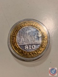 LIMITED EDITION CASINO GAMING TOKEN... MAXIM HOTEL/CASINO $10, .999 PURE SILVER COIN, WEIGHING 1.56O