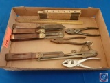 (1) Flat assorted items; wood folding ruler, ruler, pliers, knife.