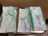 (4) bandage scissors, 1 needle holder, 4 packages of towel clamps,