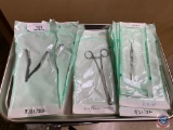 (3) staples removers, 1 ring forceups, 1 retractor, 4 allis forceups.