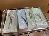 (3) hemostate , 1 mayo, scissors ,1 self retaining retractor, 1 bone cutter,