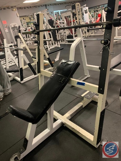 Incline bench. Need some repair on seat, (bars and clamps not included).