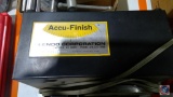 Accu-Finish machine by Glendo Corporation, bag of zip ties, 2 iron clamps