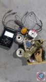 Simpson Ohms gauge, roll of wire, roll of metal band, box of assorted electrical components