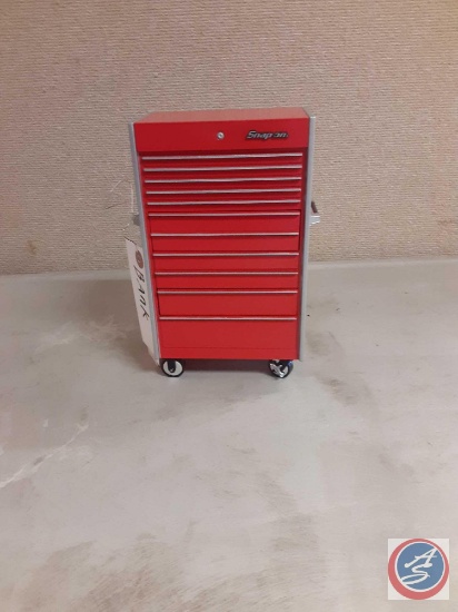 Snap on tool chest bank with tools.