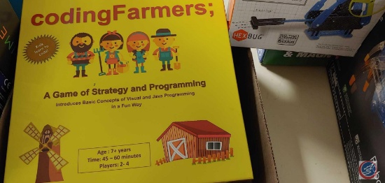 Flat with assorted items and games; Coding Farmers, Hex Bug, Phase 10, Valence , 7ate 9, Robo