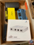 One Flat containing assorted items; Unifi Enterprise Gateway Router, WireLess keyboard, Soul Bay 12W