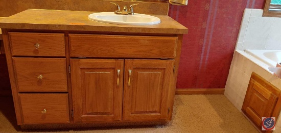 Bathroom vanity w/2-sinks w/Gold plated faucets, each vanity has 3-drawers, 2 doors and a flip down