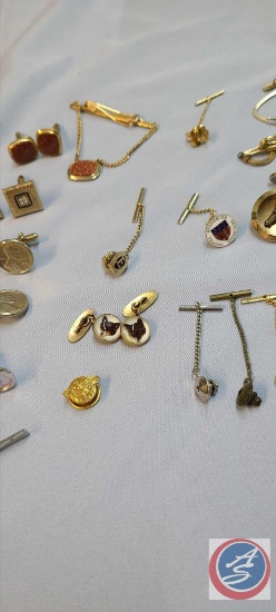 (4) sets of cufflinks, 2 are silver tone and 2 are gold tone (20) assorted tie clips and tie pins,