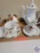 (1) Flat of Assorted China Items; Creamer, tea pot, tea cups and saucers, plates.