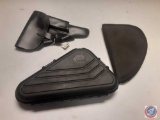 (1) Pistol Holder, (1) Hard Plastic Pistol Holder case, (1) Nylon Pistol holder.