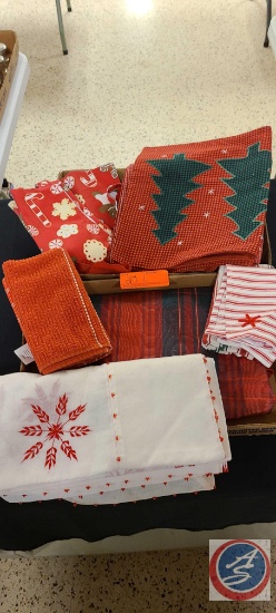 Assorted Christmas Items; Dish Rags, Table Cloth, Placemats, Apron.