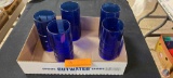 5 Blue drinking glasses, blue/white dishes with blue cooling rack, 4 corning ware baking dishes with