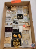 flat full of costume jewelry earrings ...