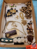 Beaded barrettes, beaded necklaces, rhinestone and chains...
