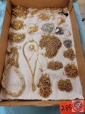 Assortment of gold and silver chains, different lengths...