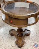 Pedestal Round Table with glass top approx measurements are; 20WX22H.