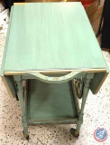 Drop Leaf Table on Wheels, Approx Measurements with sides out 37WX27DX27H, With sides down 18WX27D.