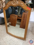large wooden framed out lining mirror... design on top approx 32 x 48 ...