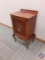 Antique mahogany music cabinet w/ hand painted door w/ musical instruments. Opens to 4 shelves w/