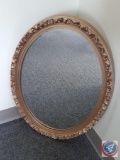 Oval wall mirror w/ reproduction frame. Mirror: 15?W x 22.5L. ...