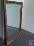 Rectangular decorative antique gold wall mirror. Frame & mirror 19.5?W x 31.5?L. Slight crack in