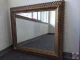 Gold wall mirror w/ outer rope design & inner decorative accents. Mirror: 31?W x 26.5?L. Frame: 42?W