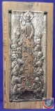 Relief metal sculpture wall hanging of Last Supper. Mounted on wood. Image: 8.5? x 20.5? Frame: 11?