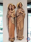 Pair wood carved statues of the Holy Family w/ flat back & bar for hanging. Two separate statues.