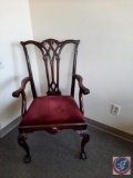 Antique hand carved chair w/ cabriole legs, curved arms, & claw feet. 40?H, 24?W, 16.5? D. Seat