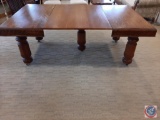 Antique carved oak dining room table w/ gadroon border. 5 solid round rib legs on castors. 48?
