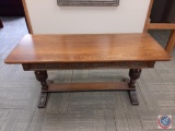 Beautiful solid oak table w/ carved floral & scroll patterns in green & red. Unique carved legs.