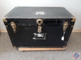 Large flattop black steamer trunk w/ metal fittings & inside tray. Broken handles & no key. H 23.5?