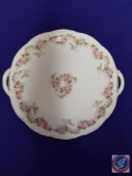 Vintage 11? round serving plate w/ handles. White w/ pink roses trim. Mark: (Orleans Z. S. & Co.