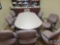 8 Cloth desk chairs and round conference table 96 x 47 1/2